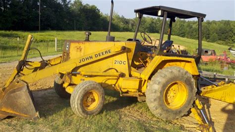 john deere 210c backhoe loader with skid steer implement mounting|john deere 210c loader specs.